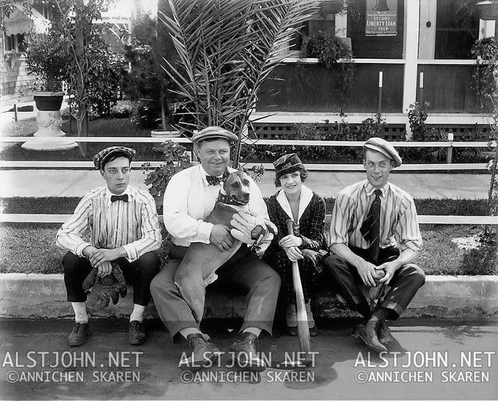 Al St. John together with Buster Keaton, Roscoe "Fatty" Arbuckle, Alice Lake, and Luke the Dog