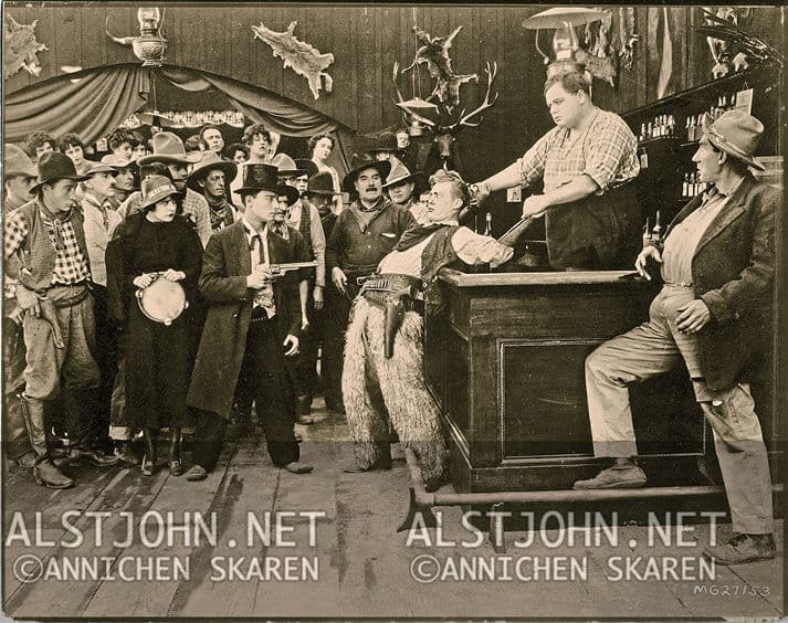 Movie still from "Out West" (1918)
